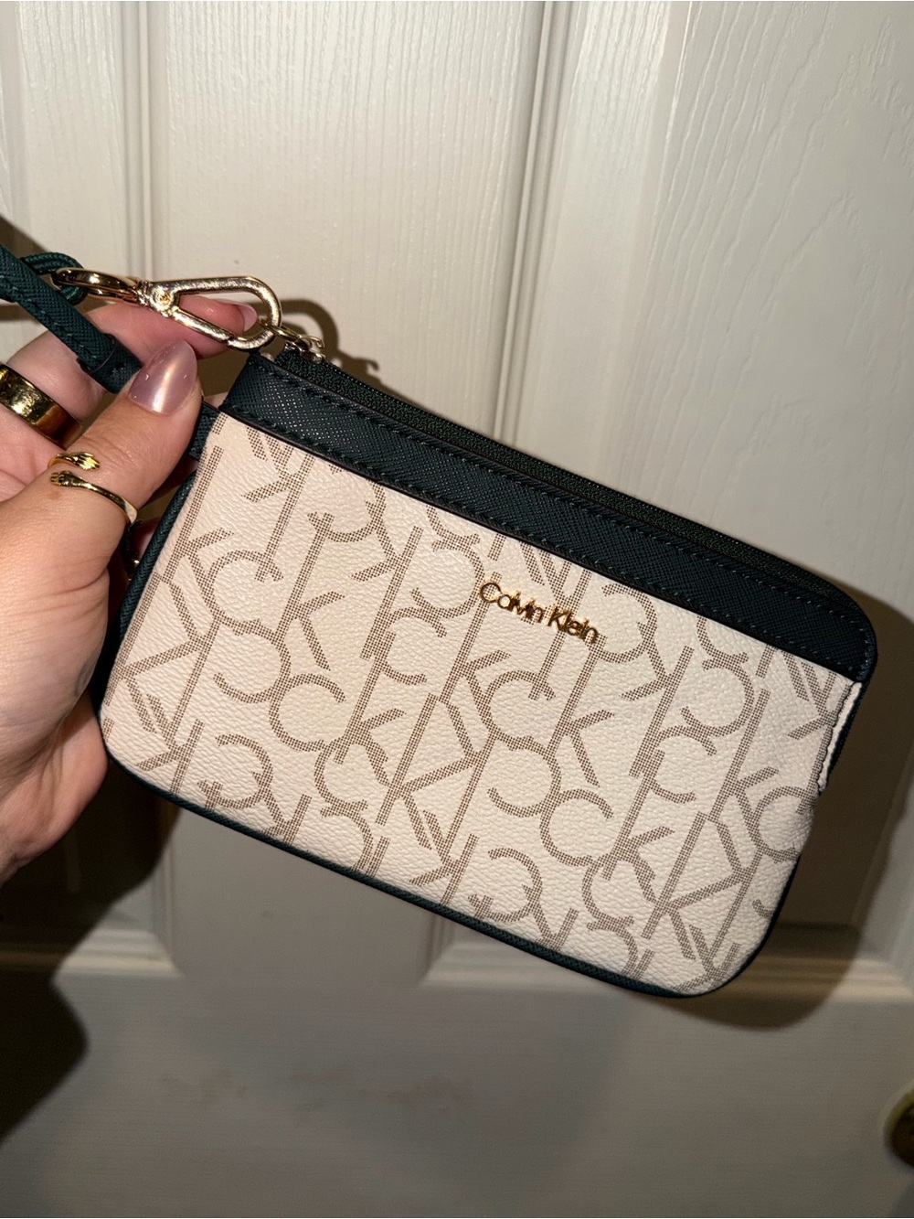 Calvin Klein Beige Monogram Wristlet with Black Trim